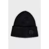 Black hat with a brand logo