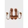 Suede stiletto sandals with tassels