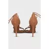 Suede stiletto sandals with tassels