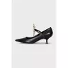 Leather shoes with massive decor