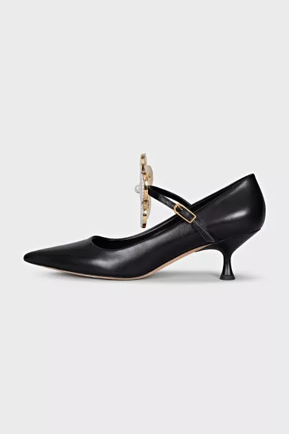 Leather shoes with massive decor