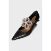 Leather shoes with massive decor