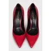 Red leather pumps