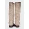 Gray boots decorated with a strap