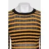 Striped jumper with back fastening