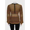 Striped jumper with back fastening