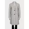 Straight-cut coat with a polka dot print