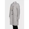 Straight-cut coat with a polka dot print
