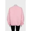 Pink sweatshirt with brand logo