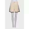 Beige shorts with contrast piping
