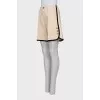 Beige shorts with contrast piping