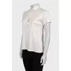 White button-down polo shirt