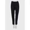 Black trousers with pleats