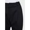 Black trousers with pleats