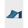 Blue mules with leather uppers