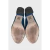 Blue mules with leather uppers
