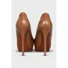 Brown pumps