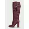 Pink boots with a tassel