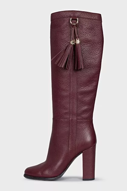 Pink boots with a tassel