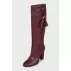 Pink boots with a tassel