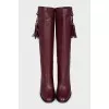 Pink boots with a tassel