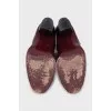 Pink boots with a tassel