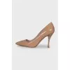 Beige patent leather pumps
