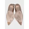 Beige patent leather pumps