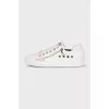 White sneakers with zippers