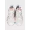 White sneakers with zippers
