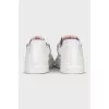 White sneakers with zippers