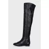 Black boots with embossed toe cap