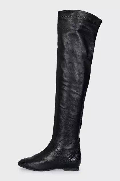 Black boots with embossed toe cap