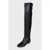 Black boots with embossed toe cap