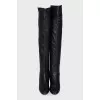Black boots with embossed toe cap