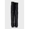 Black boots with embossed toe cap