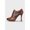 Brown ankle boots with perforated leather