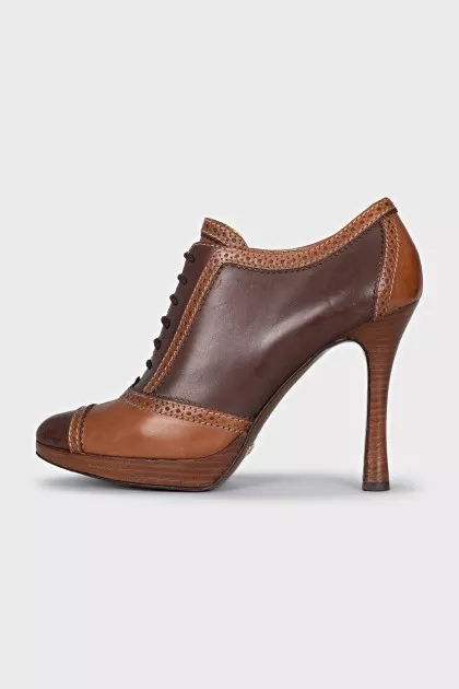 Brown ankle boots with perforated leather