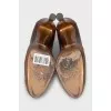Brown ankle boots with perforated leather