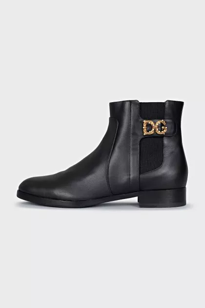 Leather boots with signature decor
