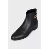 Leather boots with signature decor