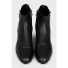 Leather boots with signature decor