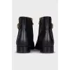 Leather boots with signature decor