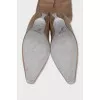 Textile boots with shiny soles