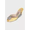 Yellow mules with silver decor