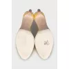 Yellow mules with silver decor