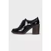 Patent leather shoes with stacked heels