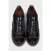Patent leather shoes with stacked heels
