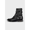 Black boots with metallic decor