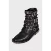Black boots with metallic decor